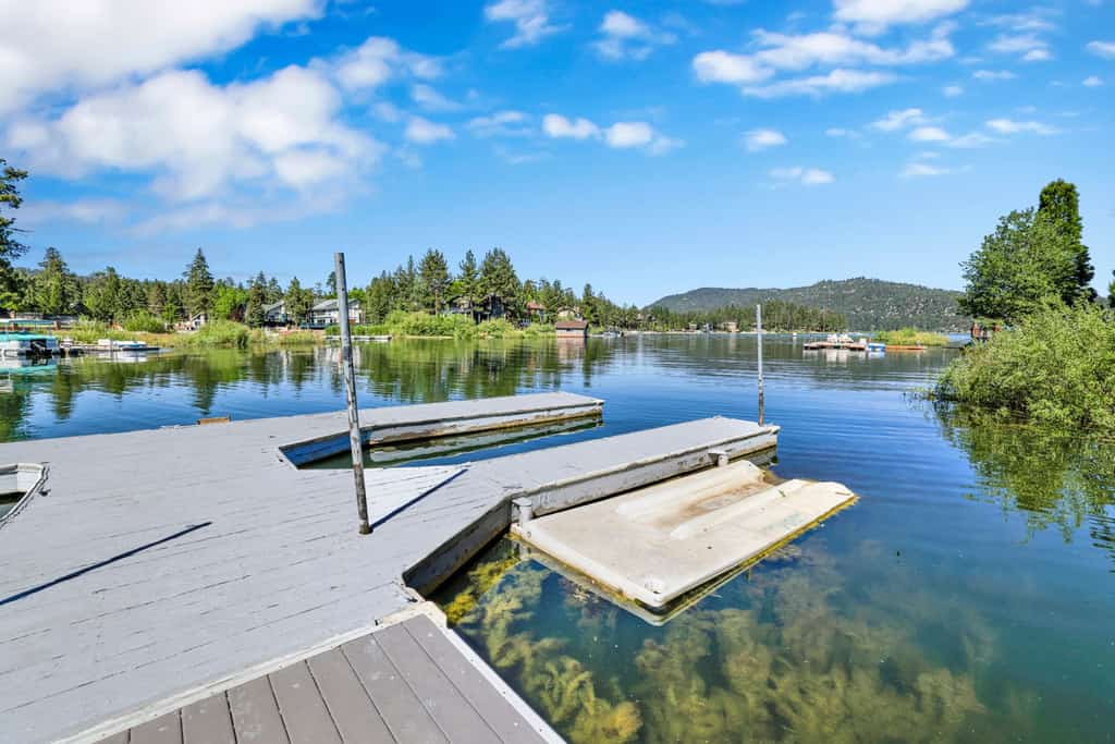 7BR/6.5BA Lakefront Estate: Private Boat Dock, Wood Fireplace & Village Access
