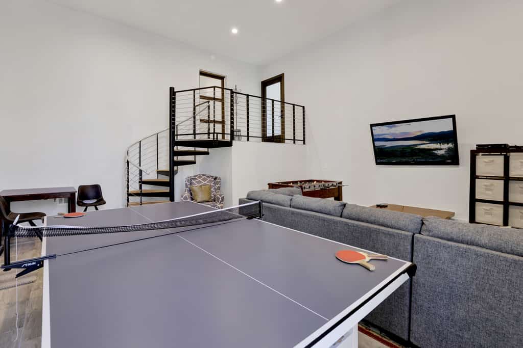 Hillside Hideaway ~ Dog-friendly home with wraparound deck, grill, game room, & bar - walk to dining