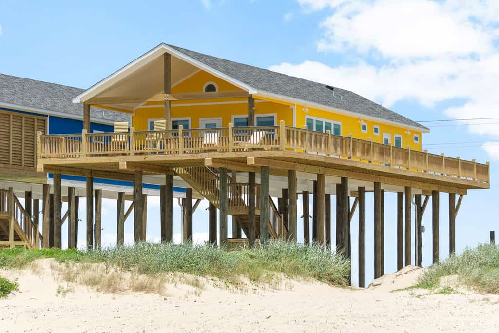 Beachfront Retreat l Hot Tub l Gulf Views, Wraparound Deck, Sleeps 12, Pet-Friendly, & More