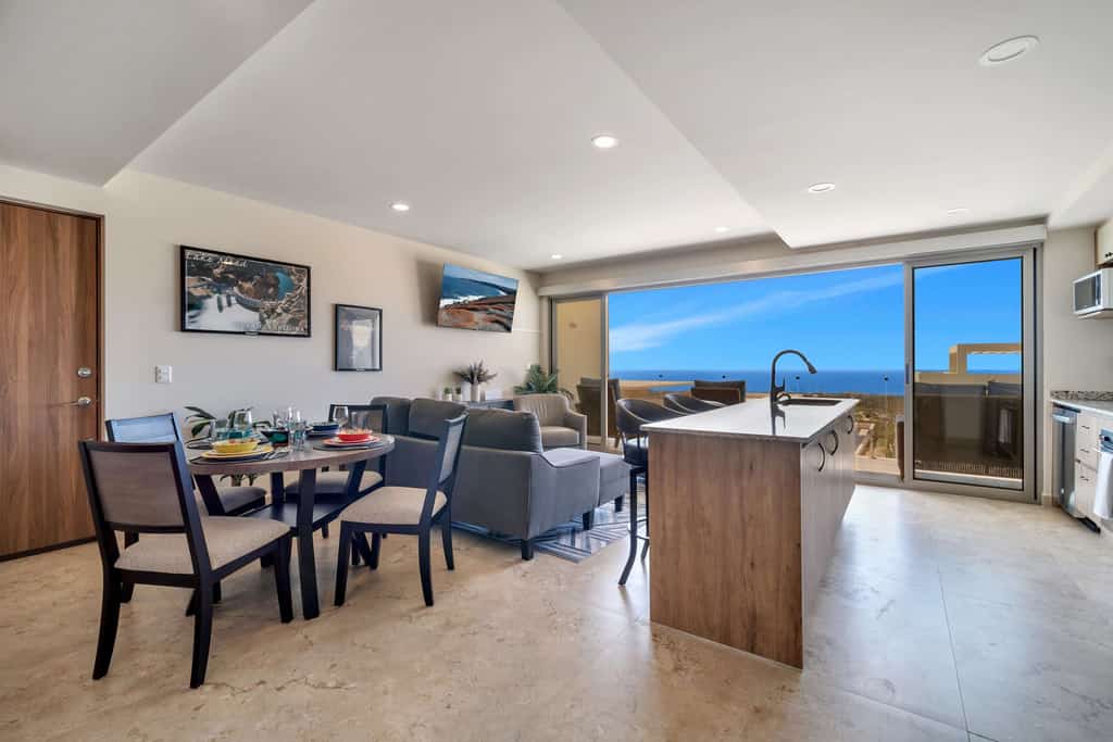 Enjoy this two-bedroom condo, thoughtfully designed with amazing ocean views
• Two king beds
• Full unit water filtration system
• Osmosis faucet in kitchen
• Community Pool with ocean views and sun loungers
• Private balcony with outdoor furniture
• Business center
• Fitness center
• Fifteen minutes driving to Cabo San Lucas downtown
• Convenience stores nearby
• Pickle Ball courts nearby (not included) 
• Fully equipped kitchen, smart TV, and AC
• 24/7 security and controlled access