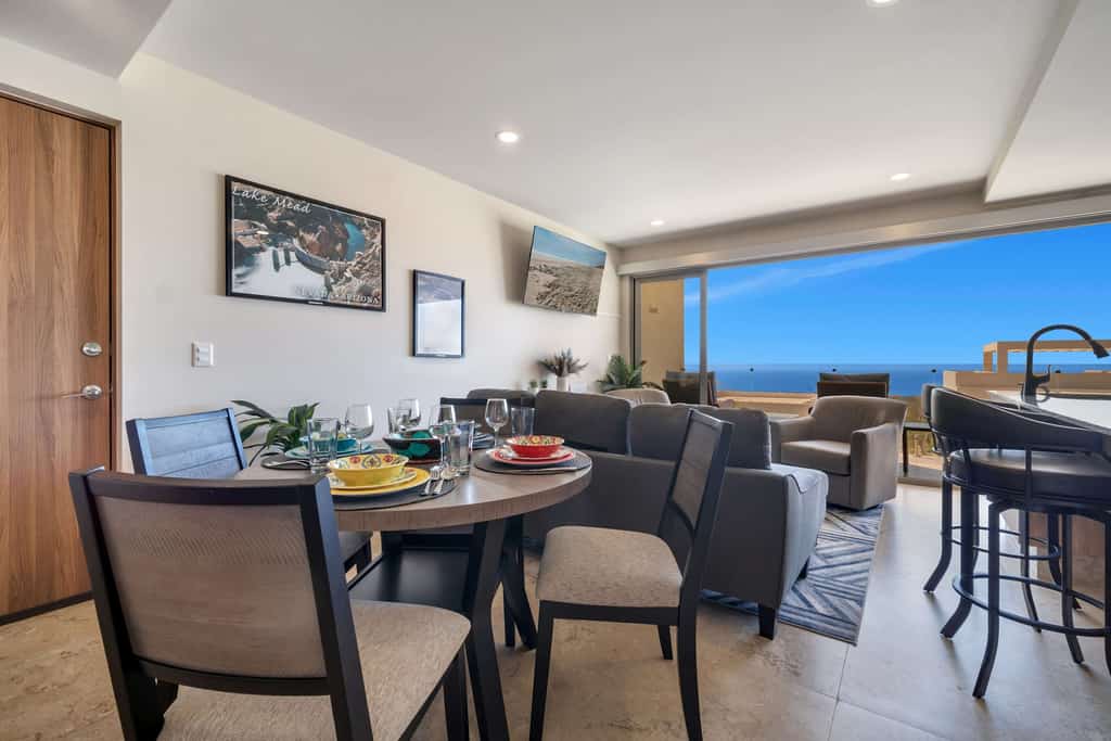 Enjoy this two-bedroom condo, thoughtfully designed with amazing ocean views
• Two king beds
• Full unit water filtration system
• Osmosis faucet in kitchen
• Community Pool with ocean views and sun loungers
• Private balcony with outdoor furniture
• Business center
• Fitness center
• Fifteen minutes driving to Cabo San Lucas downtown
• Convenience stores nearby
• Pickle Ball courts nearby (not included) 
• Fully equipped kitchen, smart TV, and AC
• 24/7 security and controlled access