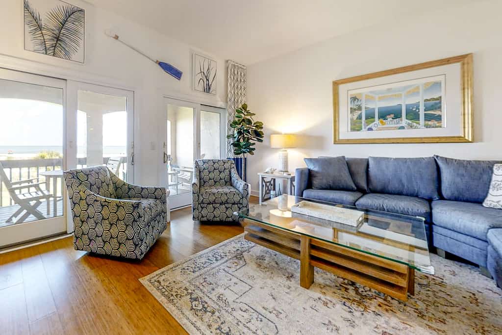 Dog-friendly oceanfront townhouse with covered balcony, views, pool & AC
