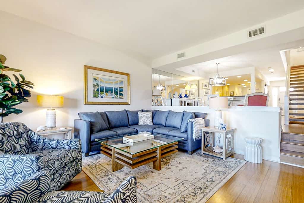Dog-friendly oceanfront townhouse with covered balcony, views, pool & AC
