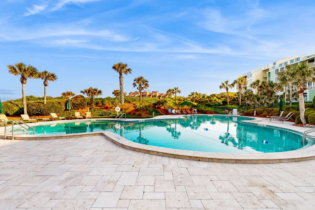 Waterfront condo with balcony, views, pool & tennis