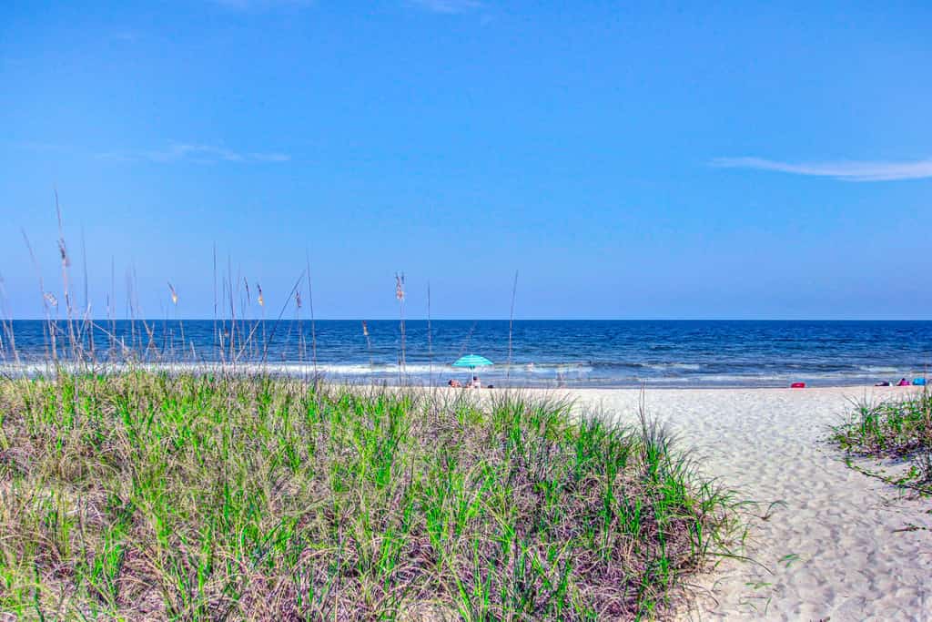 Third-floor oceanfront condo with balcony, W/D, pool & tennis