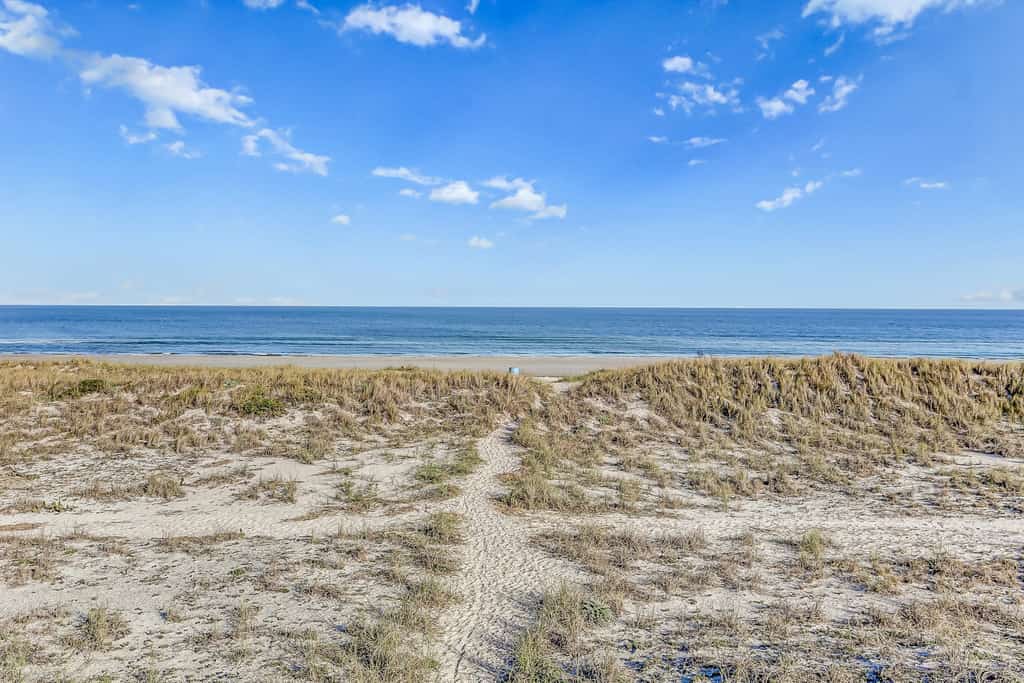 Ground-floor summer beach village condo with a great view plus patio & pool