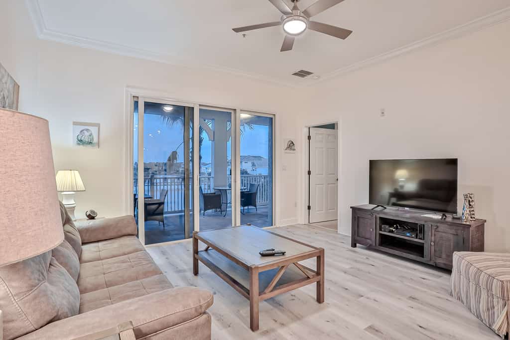Elegant waterfront condo with central AC, balcony, and shared pools & hot tubs