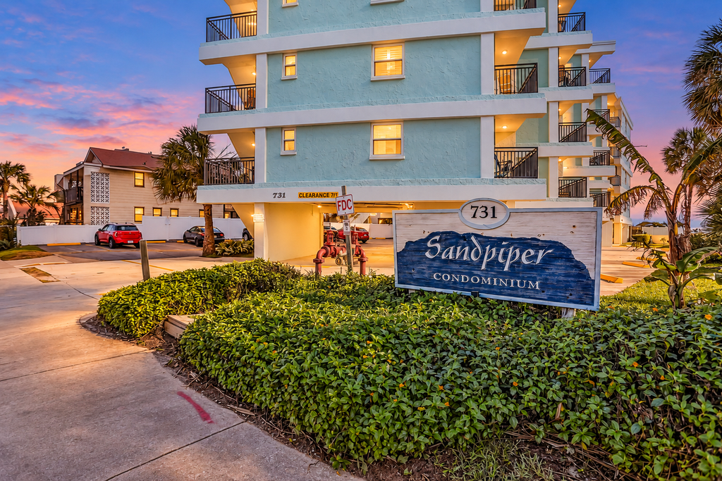 Polished oceanfront condo with pool access, private balcony & washer/dryer