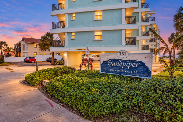 Polished oceanfront condo with pool access, private balcony & washer/dryer