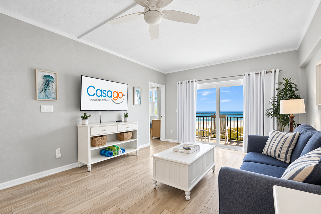 Polished oceanfront condo with pool access, private balcony & washer/dryer
