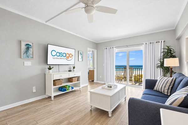 Polished oceanfront condo with pool access, private balcony & washer/dryer