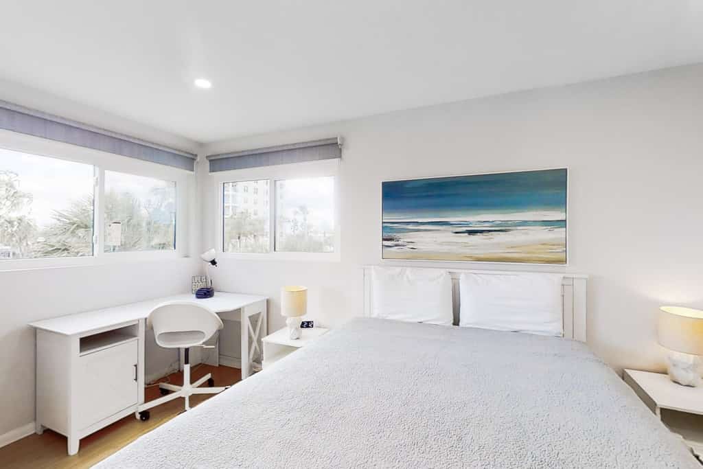 Modern condo ocean views, pool, & beach access