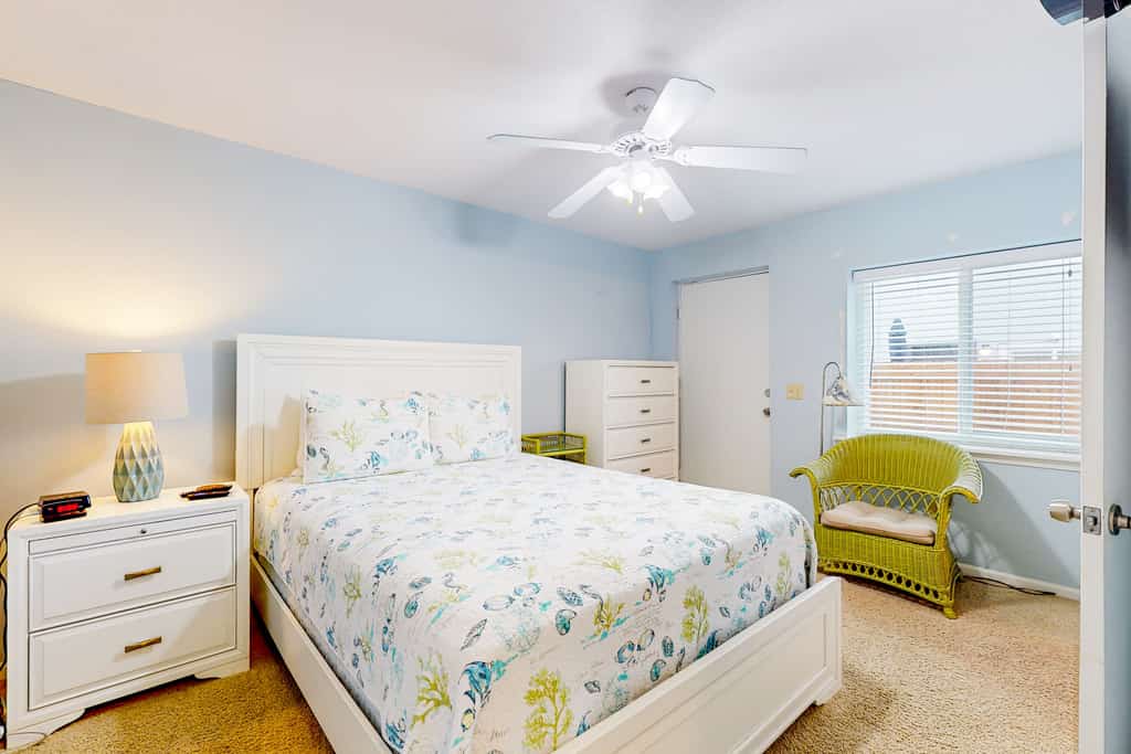 Ocean-view townhome with balcony & W/D - walk to beach - dog-friendly