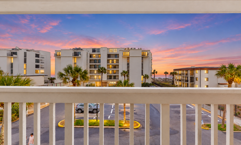 Ocean-view townhome with balcony & W/D - walk to beach - dog-friendly