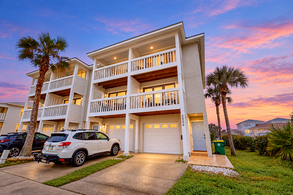 Ocean-view townhome with balcony & W/D - walk to beach - dog-friendly