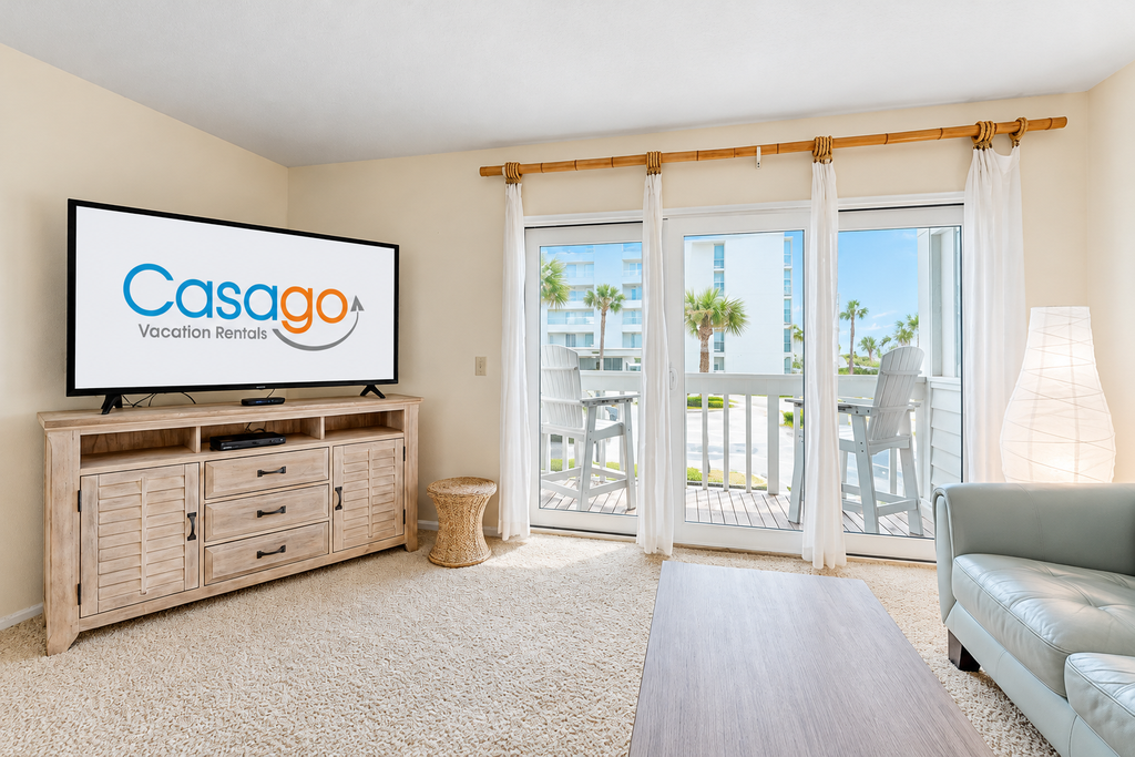 Ocean-view townhome with balcony & W/D - walk to beach - dog-friendly