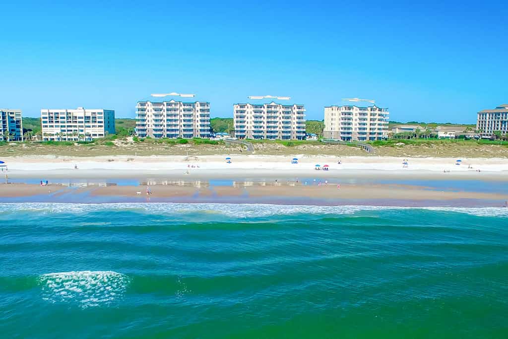 Luxurious oceanfront condo with private balcony,  2 pools, and beach access