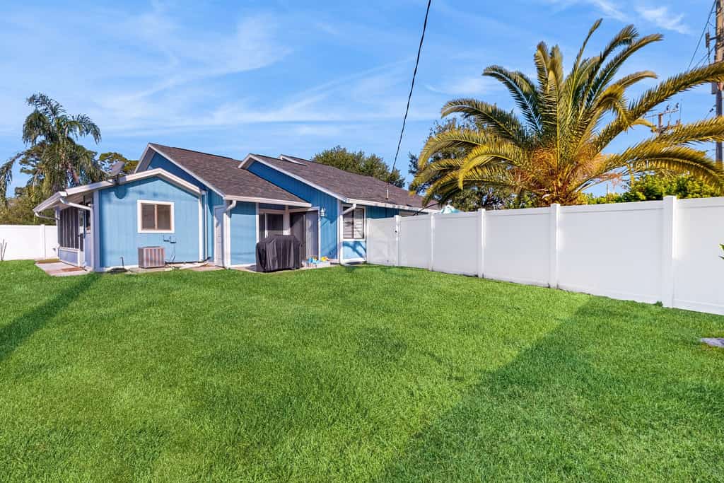 Water-view dog-friendly home with outdoor space & entertainment options