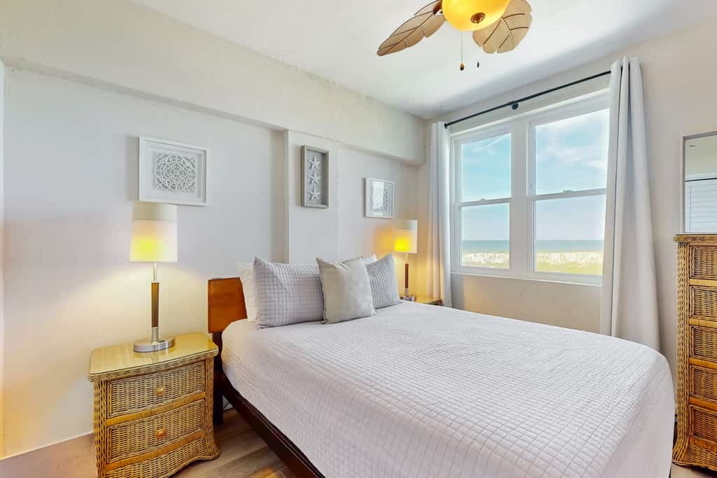 Modern oceanfront condo with outdoor pool, balcony, & washer/dryer