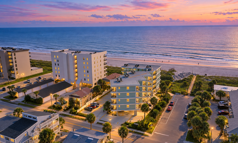 Modern oceanfront condo with outdoor pool, balcony, & washer/dryer