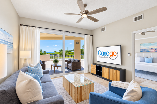 Oceanfront condo with large patio, direct water access, pool, central AC, & W/D