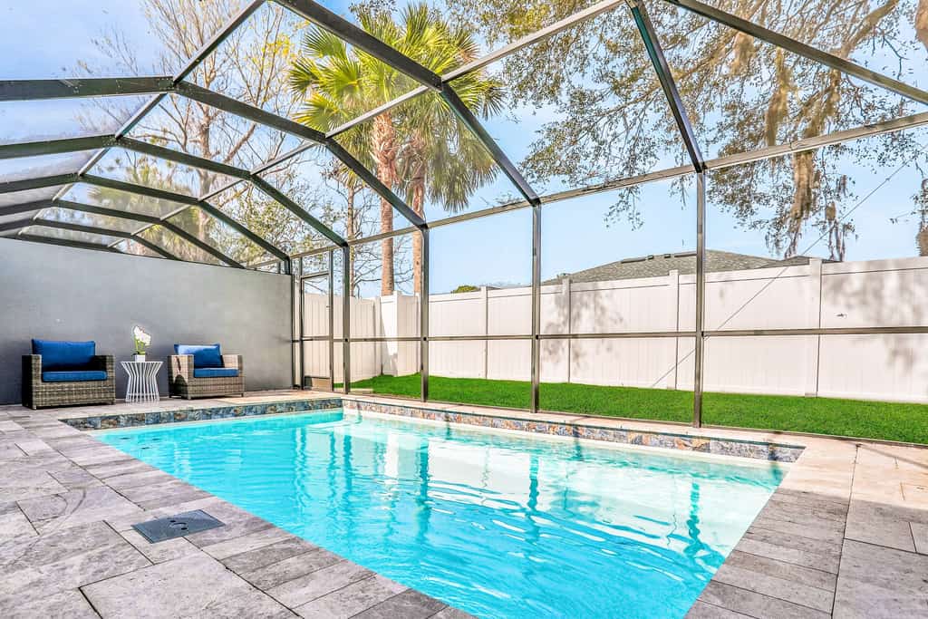 Brand-new duplex with screened pool, furnished lanai, grill, AC, & washer/dryer
