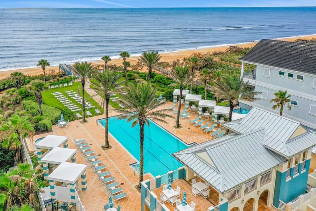 Dog-friendly lakefront condo with pools, hot tub, gym, game room & beach access