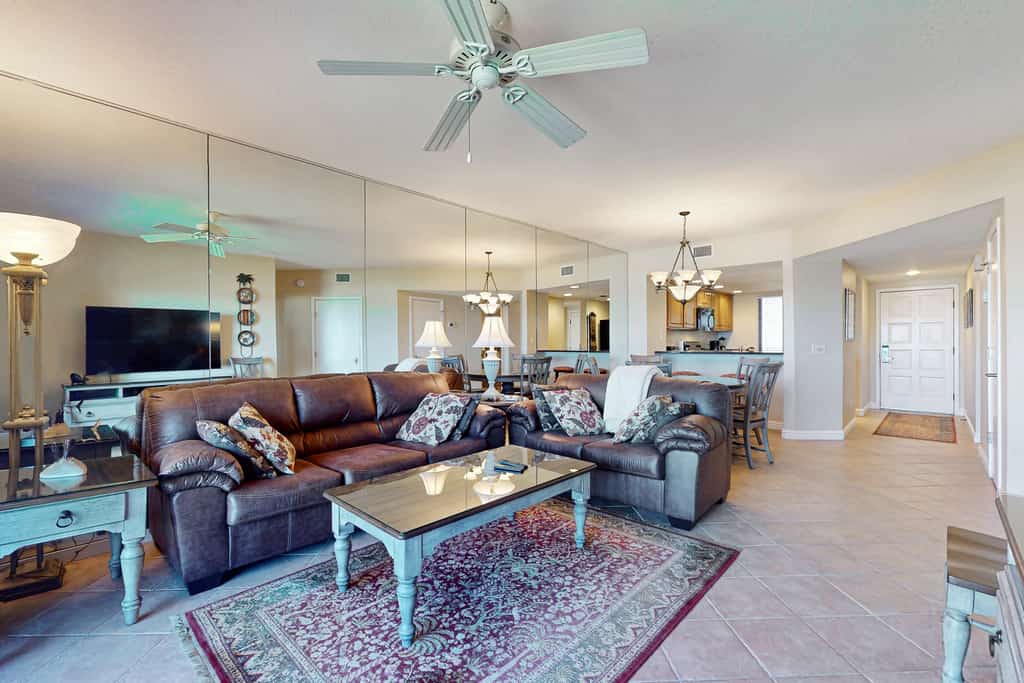 Oceanfront condo with panoramic views, shared pool, and  private washer & dryer