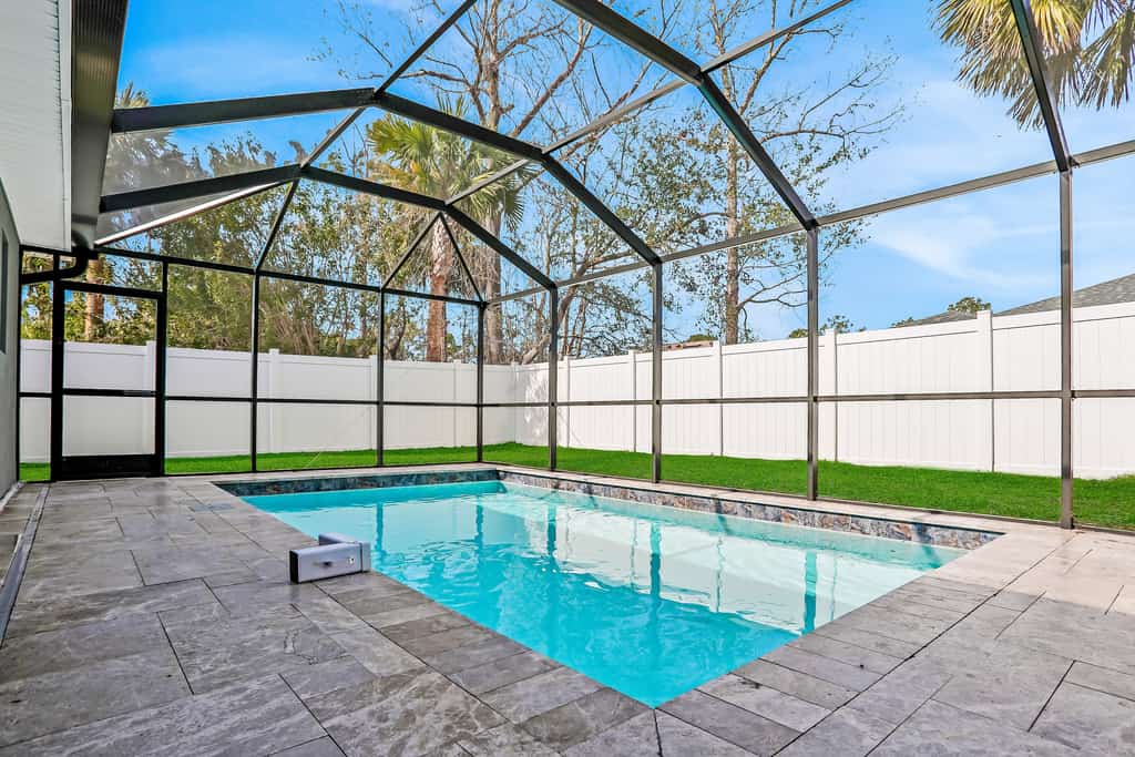 All-new duplex with screened pool, furnished lanai, grill, AC, & washer/dryer