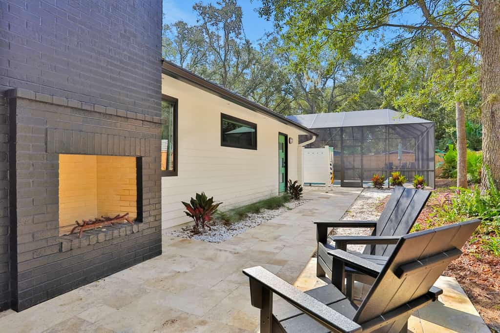 Renovated home with private pool, patio, outdoor fireplace, & grill