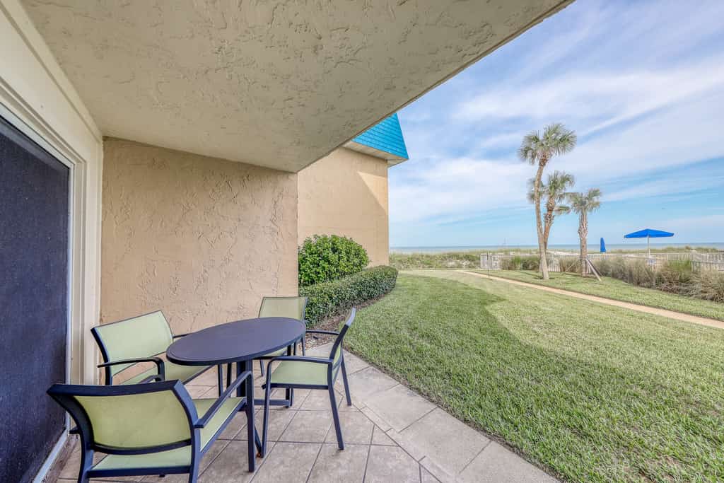 Island-themed living with furnished patio, shared pool & beach access