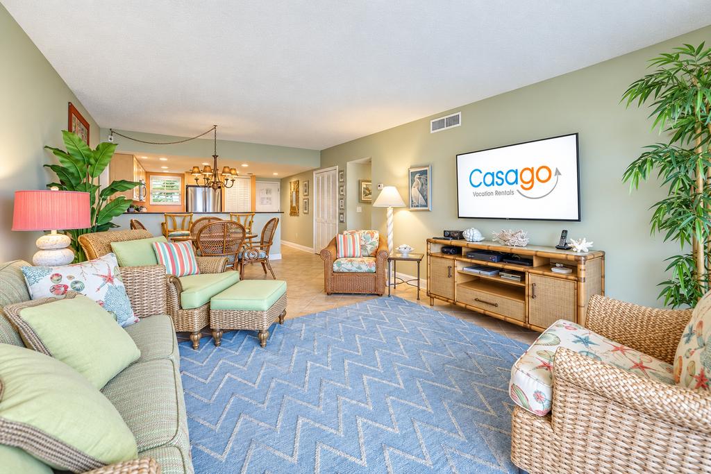Island-themed living with furnished patio, shared pool & beach access