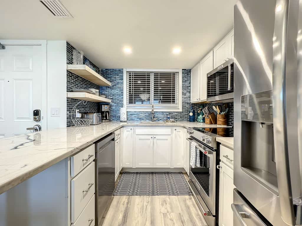 Bright 2BR beachfront condo with balcony, pool & ocean views