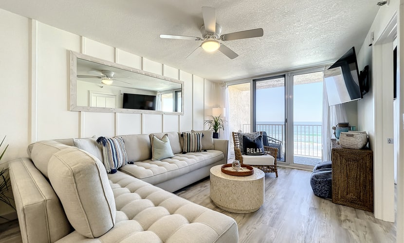 Bright 2BR beachfront condo with balcony, pool & ocean views
