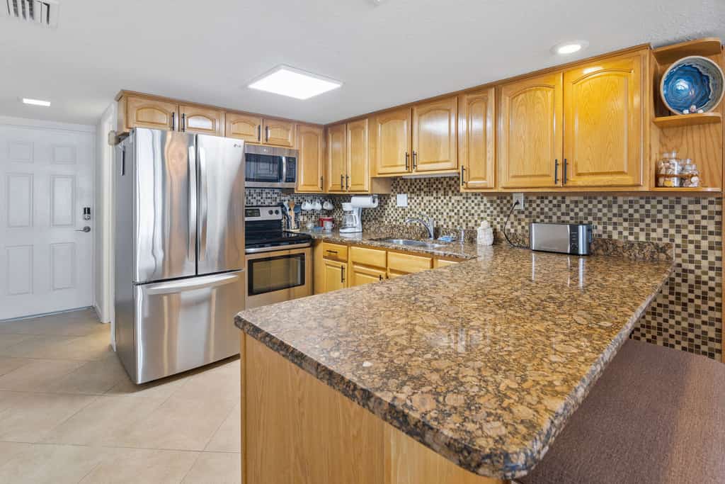 Beachfront Comfort w/ Pool, Balcony & Steps to Flagler Avenue