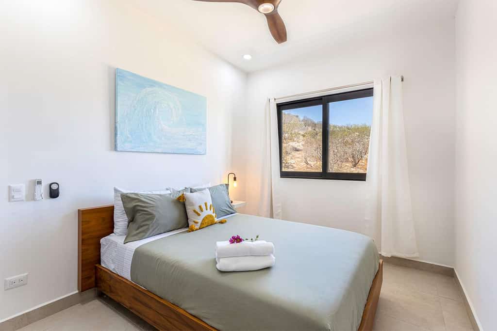 Enjoy our cozy two-bedroom apartment, with a beautiful view and an amazing rooftop terrace with rooftop pool where you can enjoy with family and friends:
• One king-size bed and one queen-size bed 
• Private balcony with outdoor chairs 
• Shared rooftop tan terrace with infinity pool, grill, and stunning ocean views
• Nearby one of the most famous mountains for hiking 
• Fast Wi-Fi, smart TV, and laundry center
• 24/7 security cameras with controlled access