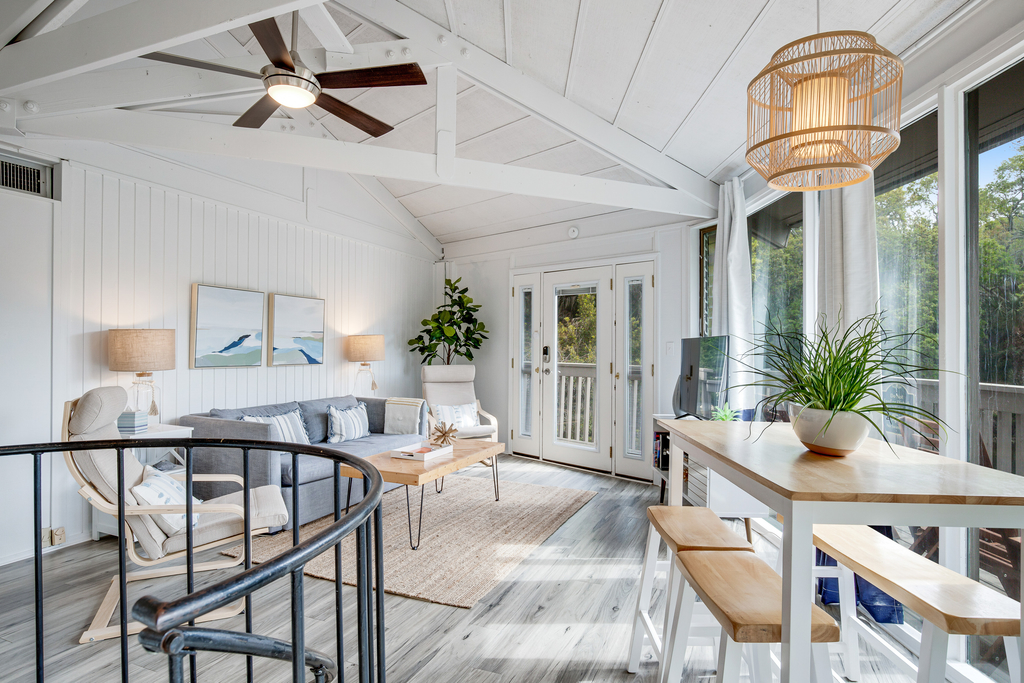 Lakefront home with lagoon view, deck & AC - close to beach, golf, & pools