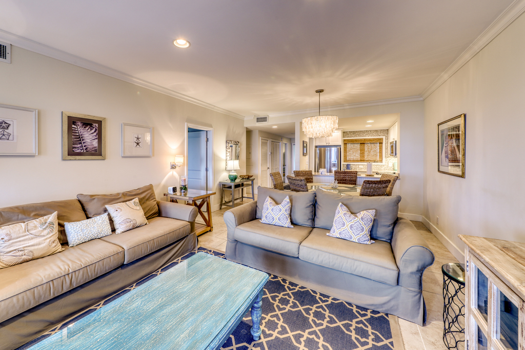 Second Floor villa w/ ocean views from deck - steps from beach for sun and sand