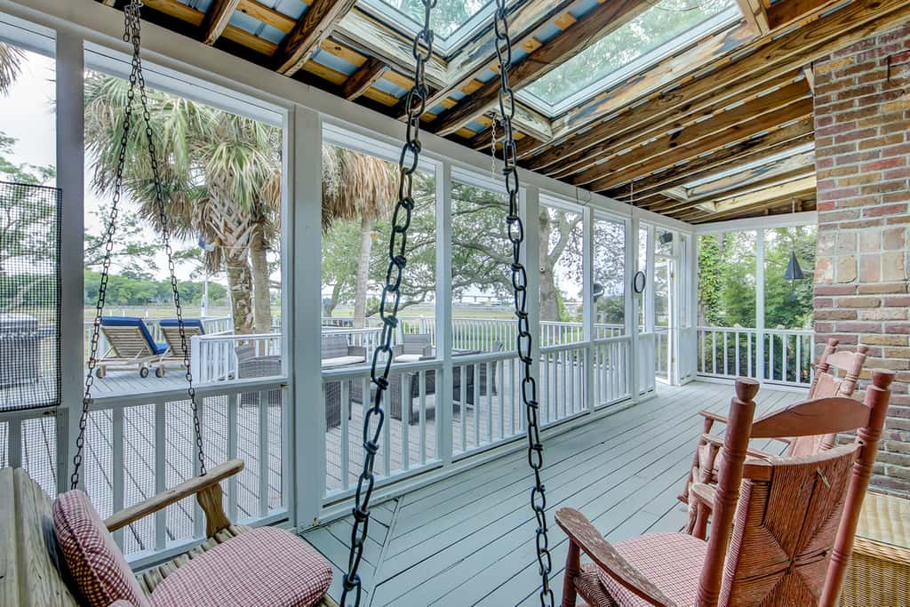 Beautiful home on lush lot with boardwalk to marsh, large deck, wifi, central ac