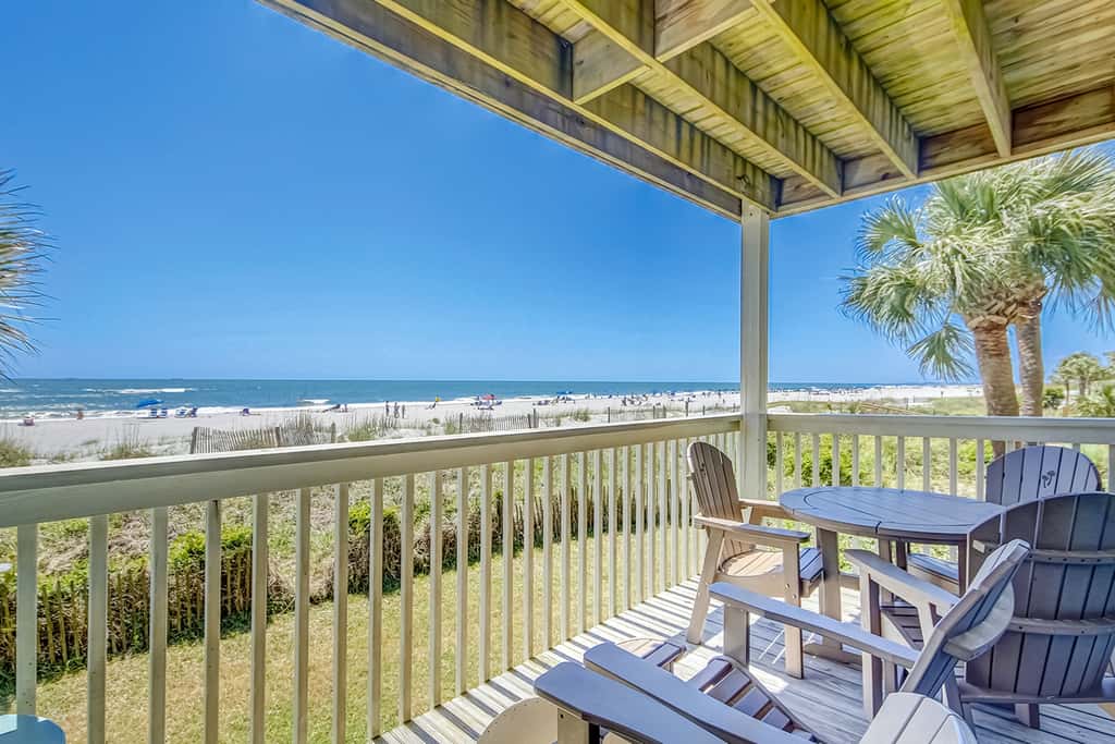Oceanfront beach condo with WiFi, washer/dryer, pool - snowbirds welcome