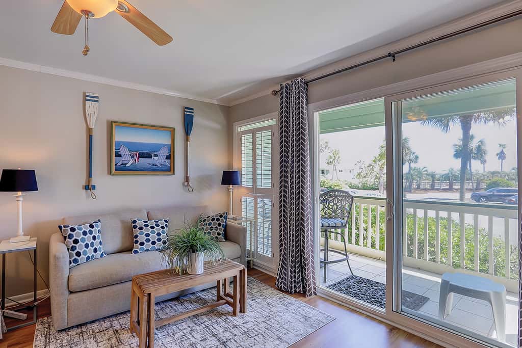 Beachfront condo with pool, beach access, pier, private balcony, & central AC