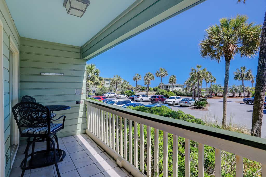 Beachfront condo with pool, beach access, pier, private balcony, & central AC