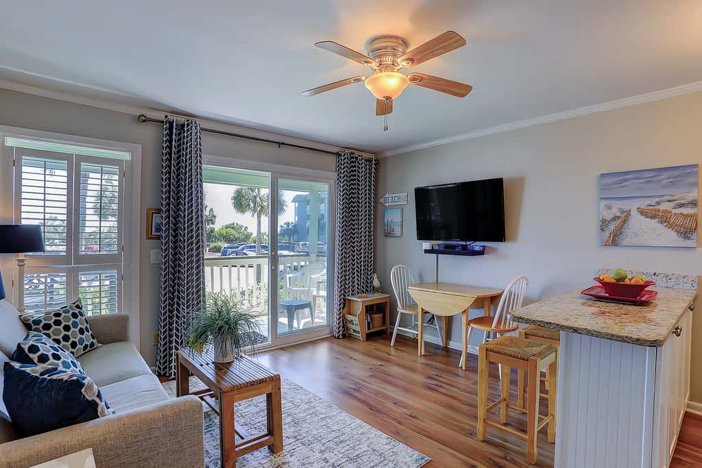 Beachfront condo with pool, beach access, pier, private balcony, & central AC