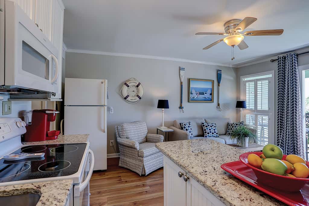 Beachfront condo with pool, beach access, pier, private balcony, & central AC