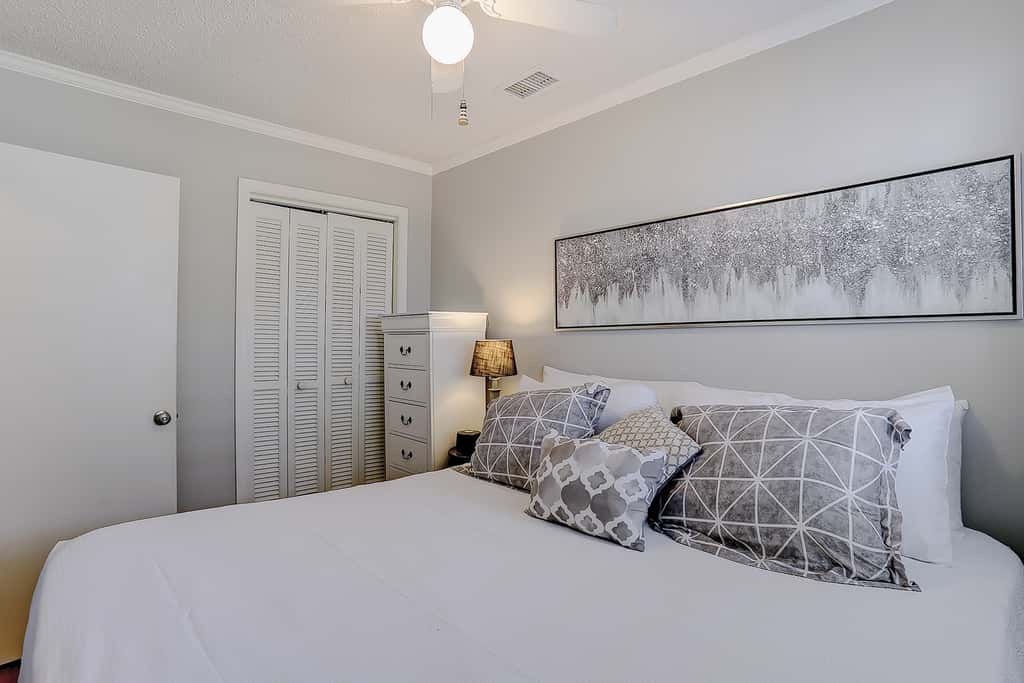 Beachfront condo with pool, beach access, pier, private balcony, & central AC