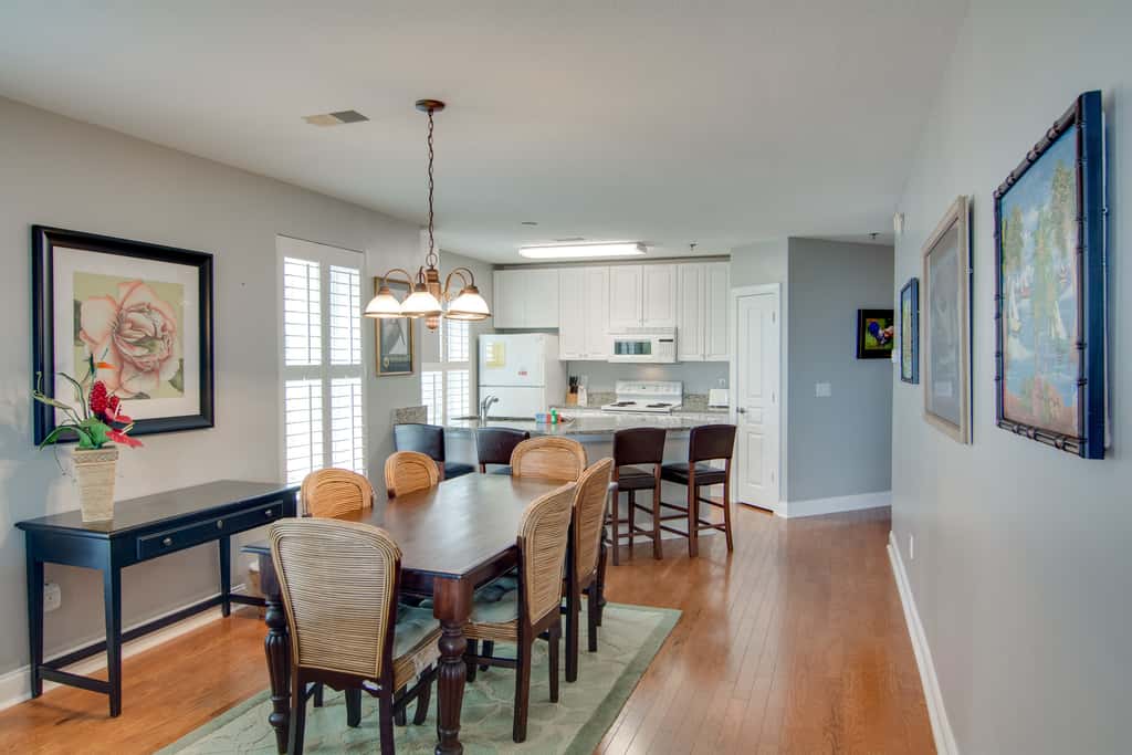 Beachfront villa w/ ocean views, private deck, pool access – steps from beach