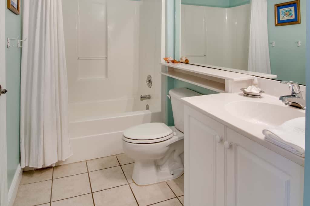 Beachfront villa w/ ocean views, private deck, pool access – steps from beach