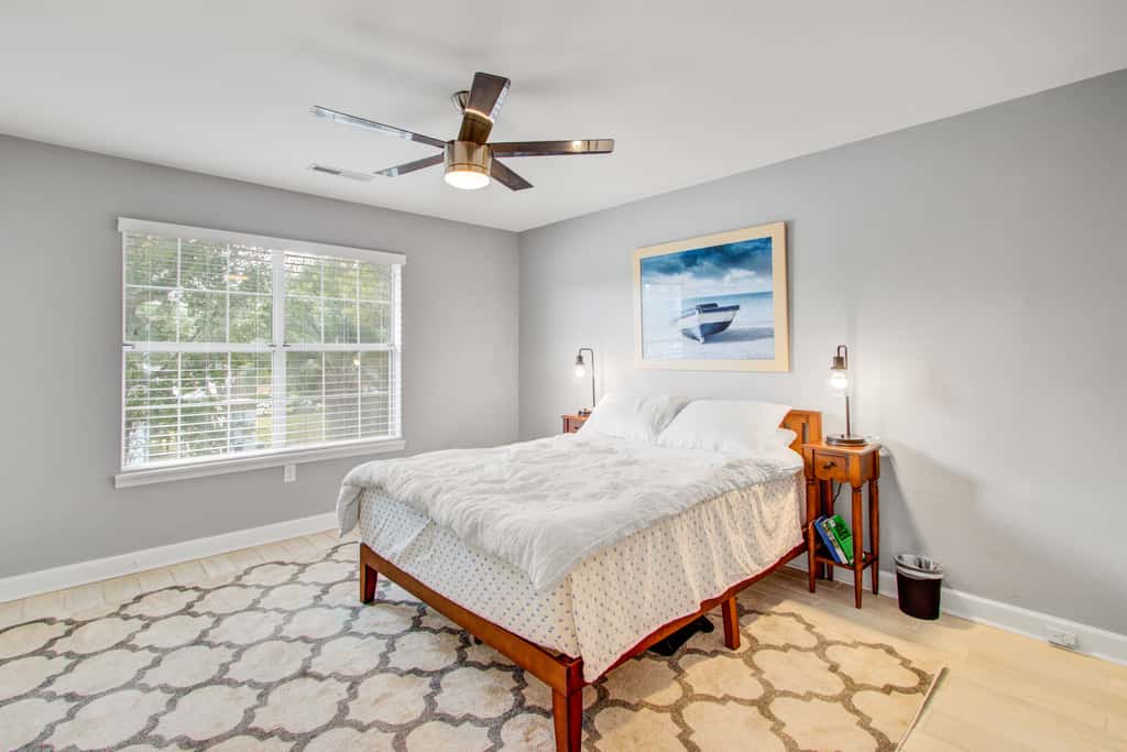 Convenient dog-friendly retreat steps from the beach with grill & screened porch