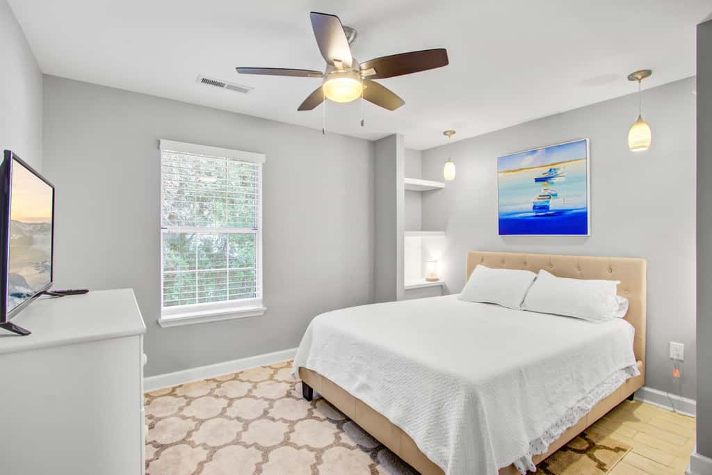 Convenient dog-friendly retreat steps from the beach with grill & screened porch
