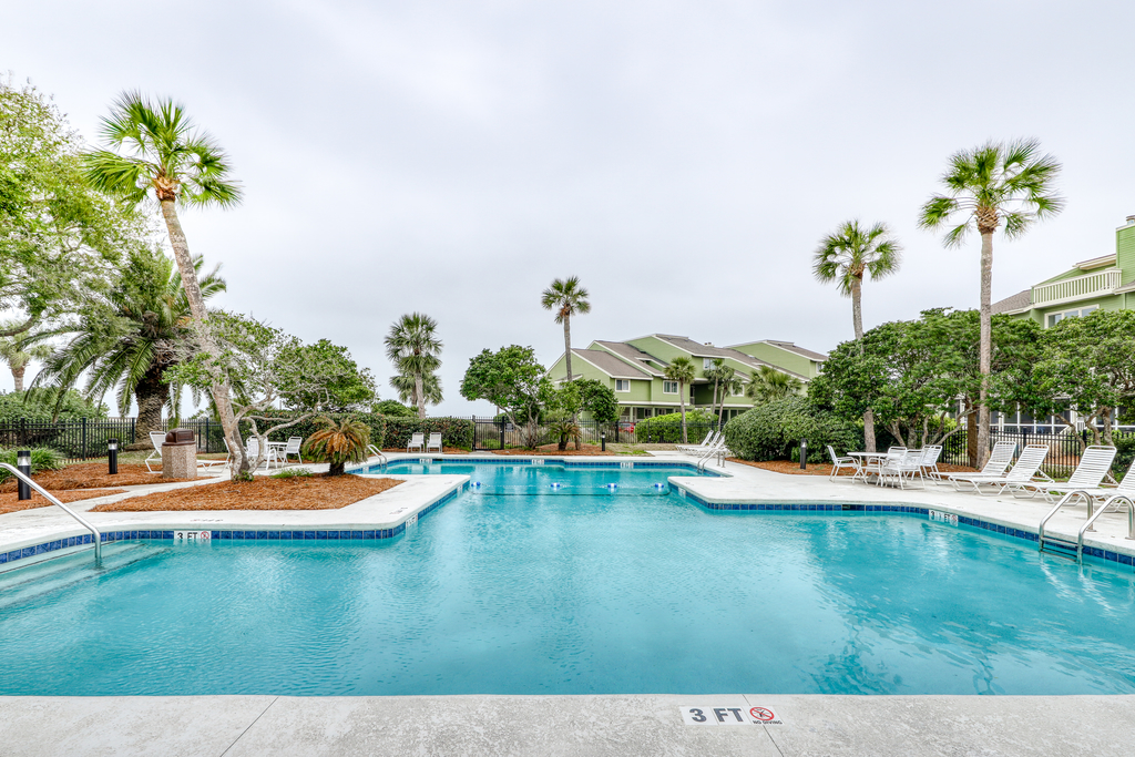 Three-story ocean-view villa with pool, balcony, charcoal grill, & central AC